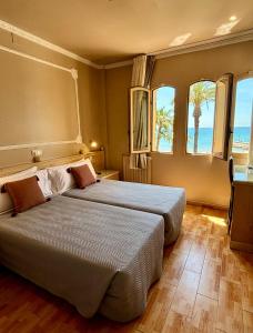 Postel nebo postele na pokoji v ubytování Hotel Celimar