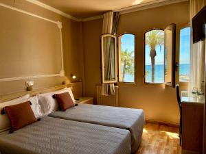 Postel nebo postele na pokoji v ubytování Hotel Celimar