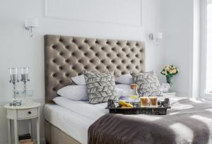 Posteľ alebo postele v izbe v ubytovaní Warsaw Seasons by Alluxe Boutique Apartments