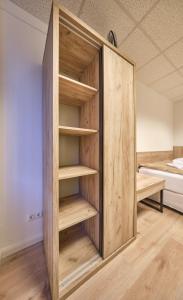 Postel nebo postele na pokoji v ubytování sleep1c