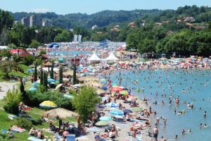 a large crowd of people at a beach at Pansion Hukić B&B in Tuzla