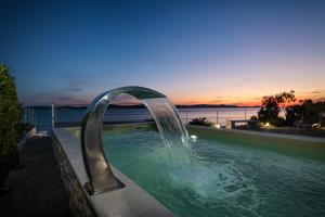 Bazén v ubytování Holiday Home Pisačić nebo v jeho okolí