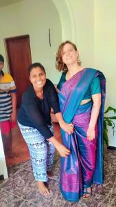 a man and a woman posing for a picture at Kuma Beach side Villa in Wadduwa