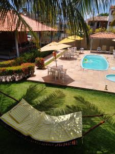 Swimmingpoolen hos eller tæt på Pousada Solar da Praia