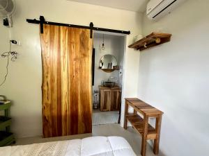 Cama o camas de una habitación en Almendros Eco-Villas