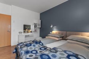Postel nebo postele na pokoji v ubytování Finnsbúð Country Residence - 30 min from Reykjavik
