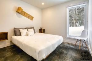 Postelja oz. postelje v sobi nastanitve Cocotte d'hiver - Chalereux avec Foyer intérieur