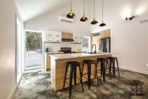 Kuhinja oz. manjša kuhinja v nastanitvi Cocotte d'hiver - Chalereux avec Foyer intérieur