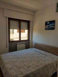 Postel nebo postele na pokoji v ubytování Luna Blu