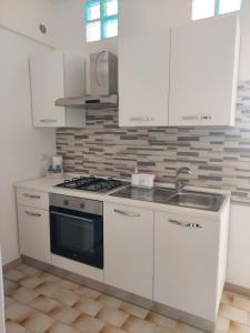 Kuchyň nebo kuchyňský kout v ubytování Luna Blu