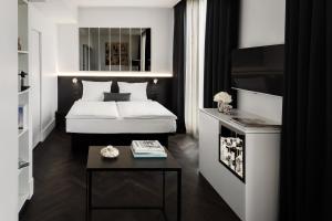 Postel nebo postele na pokoji v ubytování Hotel AMANO Grand Central