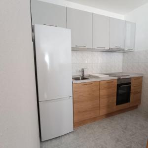 Kuchyň nebo kuchyňský kout v ubytování Apartment Katarina