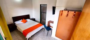 Postel nebo postele na pokoji v ubytování Hotel PARAMO LIDERATO