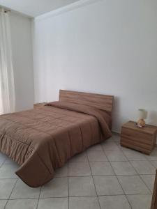 Ein Bett oder Betten in einem Zimmer der Unterkunft la casa del muratore
