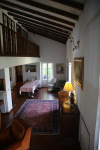 a living room with a bed and a table at Sunrise in Rapallo