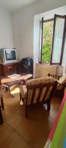 TV a/nebo společenská místnost v ubytování Villino al mare