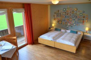 Letto o letti in una camera di Hotel Garni Hostatt