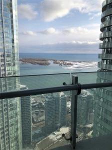 a view of the ocean from the top of a building at One bed plus Den Downtown Toronto in Toronto