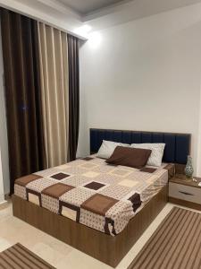 a bedroom with a bed in a room at Neama town in Sharm El Sheikh