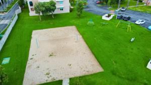 Jardín al aire libre en Daria Beachfront community steps 2 pool- Generator