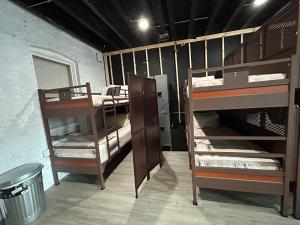 a room with three bunk beds in a building at Studio 424 in Chicago