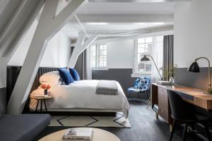 Postel nebo postele na pokoji v ubytování Kimpton De Witt Amsterdam by IHG + 37 fotografií