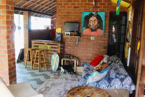 Area soggiorno di Canoa Roots Hostel & Camping
