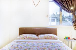 Postel nebo postele na pokoji v ubytování Snooze Hotel