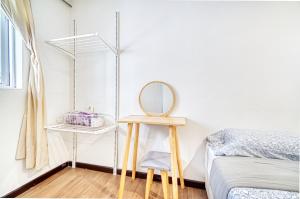 Postel nebo postele na pokoji v ubytování Snooze Hotel