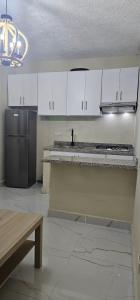 A kitchen or kitchenette at Lila House