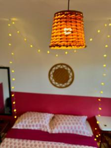 Postel nebo postele na pokoji v ubytování Pequi hostel