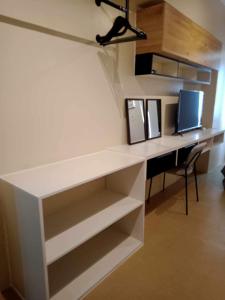 a white desk with a computer on top of it at Avida Tower 3 Unit 606 in Iloilo City