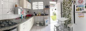 Kuchyň nebo kuchyňský kout v ubytování Pequi hostel