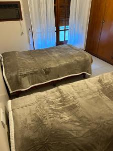 Excelente casa céntrica客房内的一张或多张床位