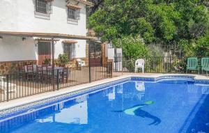 The swimming pool at or close to 8 Bedroom Lovely Home In Iznájar