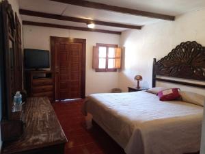 Postel nebo postele na pokoji v ubytování Hotel Cabañas Chalamu