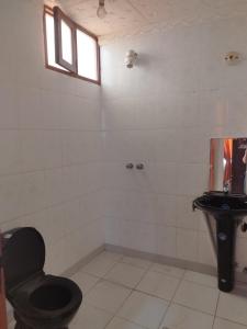 Ένα μπάνιο στο Apartamento conveniente en zona céntrica