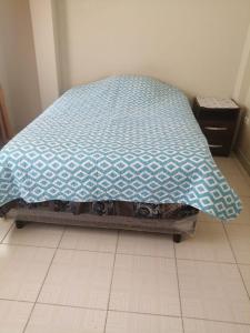 Ένα ή περισσότερα κρεβάτια σε δωμάτιο στο Apartamento conveniente en zona céntrica