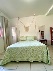 Postel nebo postele na pokoji v ubytování Pequi hostel