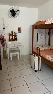 Postel nebo postele na pokoji v ubytování Pequi hostel