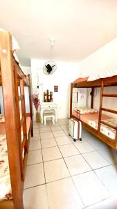 Postel nebo postele na pokoji v ubytování Pequi hostel
