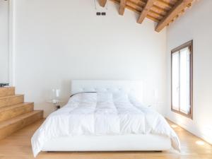 Postel nebo postele na pokoji v ubytování Residence Le Bugne
