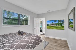 Ένα ή περισσότερα κρεβάτια σε δωμάτιο στο The Back Wave Luxury Home