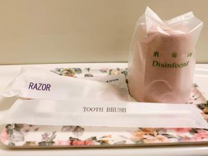 a bag of donuts and a tray of donuts at Hotel Royal Kitami - Vacation STAY 04905v in Kitami