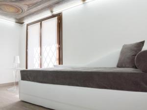 Postel nebo postele na pokoji v ubytování Residence Le Bugne