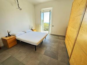 Ένα ή περισσότερα κρεβάτια σε δωμάτιο στο Villa Bellavista, Lerici