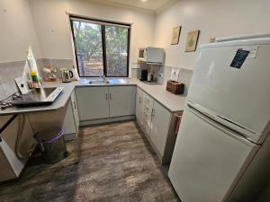 Virtuvė arba virtuvėlė apgyvendinimo įstaigoje Barossa Country Cottages