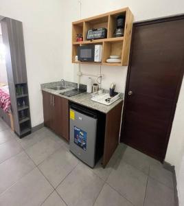 a kitchen with a sink and a counter top at Apartamento zona 1 in Guatemala