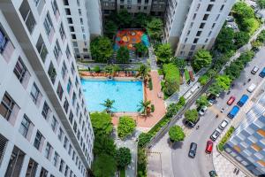 an overhead view of a pool in the middle of a city at Spacious 2 Bed Rooms Condo in Masteri Thao Dien in Ho Chi Minh City