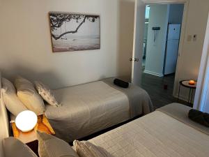 Ένα ή περισσότερα κρεβάτια σε δωμάτιο στο Eleven - Oceanside Retreat Busselton +25 φωτογραφίες
